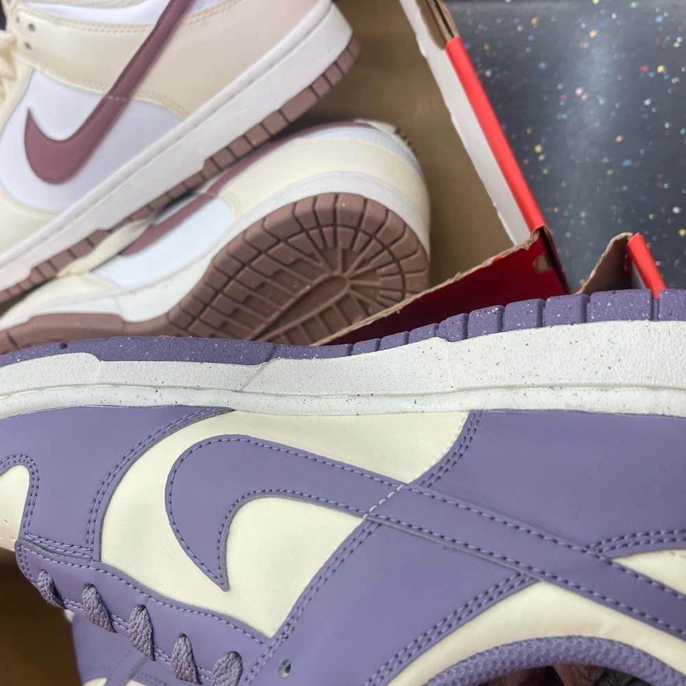 New purple and cream Jordan 1 low Nike.